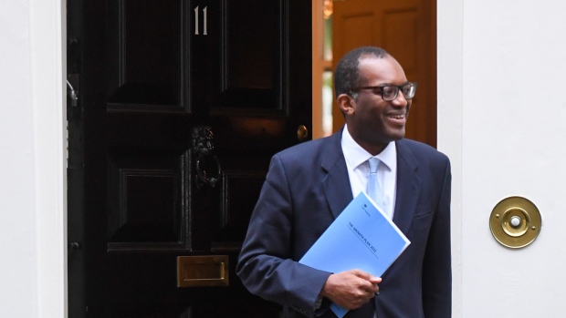 Kwasi Kwarteng, UK chancellor of exchequer, departs 11 Downing Street to present the UK's fiscal plans in Parliament, in London, UK, on Friday, Sept. 23, 2022. With expectations of tax cuts and sweeping deregulation, businesses are likely to be a big beneficiary of Kwarteng's mini-budget on Friday.