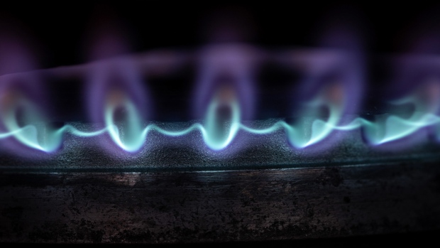 Gas burns on a domestic oven hob inside a residential apartment in Corbera De Llobregat, Spain, on Wednesday, Jan. 12, 2022. Natural gas prices in Europe jumped to the highest level in a week as fears about a possible military action in Ukraine raise concerns that Russian supplies may get even more limited during the coming winter months. Photographer: Angel Garcia/Bloomberg