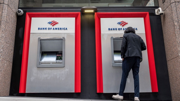 A customer uses an automated teller machine (ATM) at a Bank of America bank branch in San Francisco, California, U.S., on Monday, July 12, 2021. Bank of America Corp. is expected to release earnings figures on July 14.