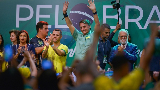CONTAGEM, BRAZIL - SEPTEMBER 23: President of Brazil and Presidential candidate Jair Bolsonaro shows gratitude to supporters during an evangelical event called 'Women for Brazil' as part of a rally to close the penultimate week of campaign ahead of October 02 elections on September 23, 2022 in Contagem, Brazil. On Friday 26, Bolsonaro leads rallies in two cities of Minas Gerais, a key district to counteract Lula's votes. (Photo by Fred Magno/Getty Images)