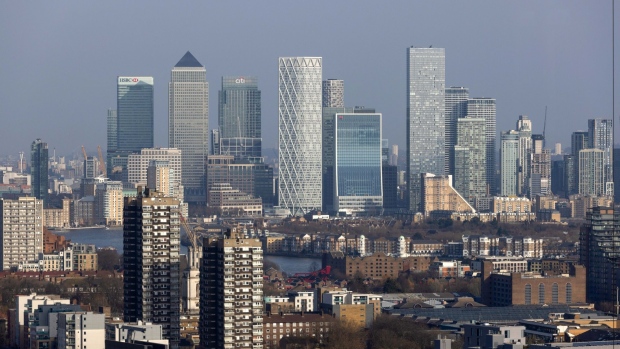 Skyscrapers in the Canary Wharf business, shopping and financial district on the skyline in London, U.K., on Monday, March 21, 2022. The U.K. is expanding the Financial Conduct Authority’s powers in a package of post-Brexit changes to the way it regulates the City of London. Photographer: Chris Ratcliffe/Bloomberg