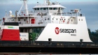 A Seaspan ferry departs the dock during a strike in Swartz Bay, British Columbia, Canada, on Friday, Jan. 21, 2022. Deliveries of goods to Vancouver Island could be disrupted as Seaspan Ferries Corp. will be restricted to 30 per cent of its carrying capacity due to a labor-management dispute, the Times Colonist reports.