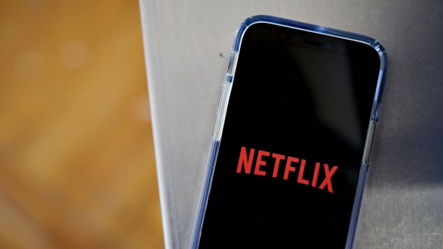 The Netflix Inc. logo on a smartphone arranged in the Brooklyn Borough of New York, U.S., on Friday, Oct. 15, 2021. Netflix Inc. is scheduled to release earnings figures on October 19. Photographer: Gabby Jones/Bloomberg