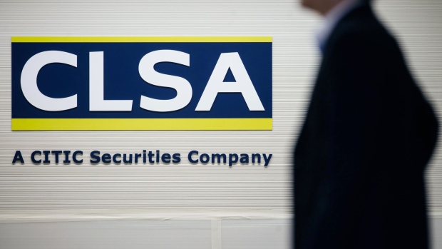 The CLSA Ltd. logo is displayed at the company's office in Hong Kong, China, on Wednesday, July 5, 2017. Citic Securities paid about $1.2 billion for CLSA as it stepped up efforts to expand abroad, and merged its Hong Kong investment-banking operations with those of CLSA in 2015. Photographer: Anthony Kwan/Bloomberg