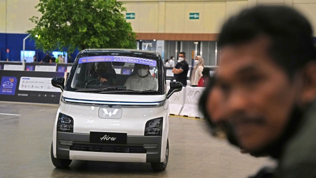 A Wuling Air electric vehicle (EV) on a test-drive course at the Gaikindo Indonesia International Auto Show (GIIAS) in BSD City, Tangerang, Indonesia, on Thursday, Aug. 18, 2022. The GIIAS runs through Aug. 21.