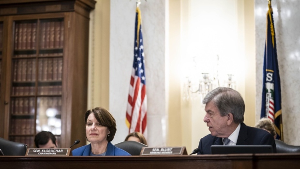 Senator Amy Klobuchar, a Democrat from Minnesota and chair of the Senate Rules and Administration Committee, speaks as ranking member Senator Roy Blunt, a Republican from Missouri, listens during a hearing in Washington, D.C., U.S., on Wednesday, June 16, 2021. Capitol Police were ill-prepared for the Jan. 6 insurrection because of deficiencies in leadership decision-making under fire, threat analysis and equipment and training, according to the department's top internal watchdog.