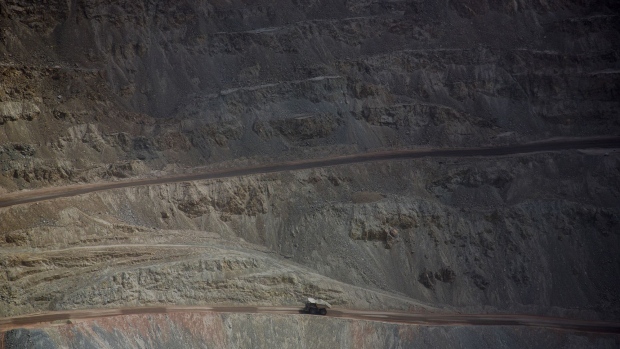 A truck transports minerals inside the Codelco Chuquicamata open pit copper mine near Calama, Chile, on Thursday, Aug. 2, 2018. Protests at the Chuquicamata copper mine in late July were the first labor disruptions in Chile this year, and happened amid calls for a strike from the union at the world's largest mine, BHP Billiton Ltd.'s Escondida. Photographer: Cristobal Olivares/Bloomberg