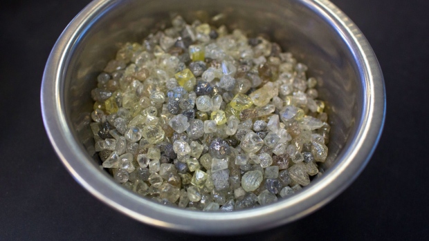 Rough diamonds from Yakutia sit in a bowl during the sorting and evaluation process at the United Selling Organisation (USO) of Alrosa PJSC sorting center in Moscow, Russia, on Tuesday, Feb. 12, 2019. Alrosa PJSC, one of the world’s top diamond miners, is returning to crisis-stricken Zimbabwe, the latest example of Russia expanding its footprint in Africa. Photographer: Andrey Rudakov/Bloomberg