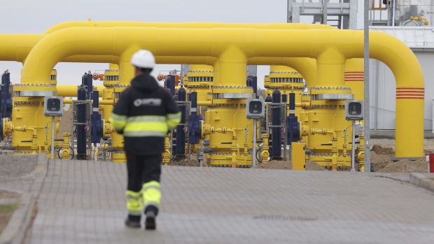 GOLENIOW, POLAND - SEPTEMBER 27: A worker of Polish natural gas company Gaz System walks among pipes at a compressor station of the new Baltic Pipe natural gas pipeline on the day of the pipeline's official opening on September 27, 2022 near Goleniow, Poland. The new pipeline connects Norwegian natural gas fields in the North Sea with Denmark and Poland. Countries across Europe are seeking to expand their natural gas supplies as they pivot away from imports of natural gas from Russia. (Photo by Sean Gallup/Getty Images)