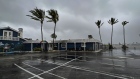 A closed restaurant at Fort Myers Beach in Fort Myers, Florida, US, on Wednesday, Sept. 28, 2022. Hurricane Ian rapidly gained strength -- with winds reaching 155 miles an hour -- as it barreled toward the coast of Florida, threatening to rip roofs off of homes, wreck agricultural crops and cripple infrastructure as one of the costliest storms to ever hit the US.