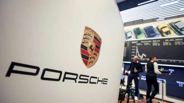 Signage for Porsche AG inside the Frankfurt Stock Exchange, operated by Deutsche Boerse AG, following the automaker's initial public offering (IPO) in Frankfurt, Germany, on Thursday, Sept. 29, 2022. The sports-car maker rose as much 2.9% to €84.90 after slipping to its offer price of €82.50 apiece, the top end of VW’s initial range for the shares that valued the company at €75 billion ($73 billion). Photographer Alex Kraus/Bloomberg