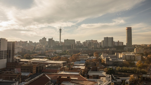 Commercial properties, residential buildings and skyscraper offices, including the Hillbrow Tower, left, and the Ponte Tower, right, on the skyline viewed from a rooftop bar in Johannesburg, South Africa, on Thursday, May 21, 2021. Traders raised bets that South Africa’s central bank will tighten policy this year after inflation accelerated more than expected, resulting in a negative real interest rate for the first time in more than five years. Photographer: Guillem Sartorio/Bloomberg