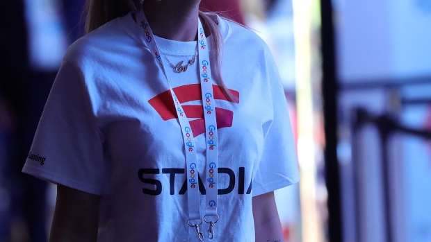 An employee wears a Stadia cloud gaming streaming service branded t-shirt on the Google Inc. exhibition stand at the Gamescom gaming industry event in Cologne, Germany, on Tuesday, Aug. 20, 2019. Gamescom is the world's largest gaming convention and runs from August 20 to 24.