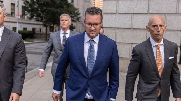 Trevor Milton, founder of Nikola Corp., exits court in New York, US, on Monday, Sept. 12, 2022. Milton, who enticed auto-industry leaders and investors with his promise for a revolution in electric trucks, faces a securities-fraud trial beginning this week on allegations that he lied about his company's development of environmentally friendly technology.