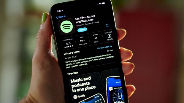 The Spotify application for download in the Apple App Store on a smartphone arranged in the Brooklyn borough of New York, US, on Friday, July 22, 2022. Spotify Technology SA is scheduled to release earnings figures on July 27.
