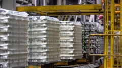 Wrapped stacks of aluminum ingots travel along a packing line at the United Co. Rusal aluminium smelting plant in Shelekhov, Russia, on Friday, April 9, 2021. Rusal has produced aluminum with the industry’s lowest carbon footprint of less than 0.01 tons of CO2 equivalent per ton of metal, the company’s parent En+ said in a statement. Photographer: Andrey Rudakov/Bloomberg