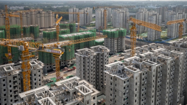 The China Evergrande Group Royal Peak residential development under construction in Beijing, China, on Friday, July 29, 2022. A mild rally in Chinese developers’ dollar bonds appears to be losing momentum, as investors express disappointment that a top leadership meeting failed to unveil stronger policy support for the crisis-ridden industry. Bloomberg