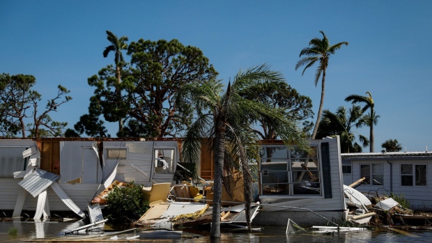 A destroyed house at a flooded trailer park following Hurricane Ian in Fort Myers, Florida, US, on Thursday, Sept. 29, 2022. Ian, now a hurricane again, is threatening to carve a new path of destruction through South Carolina Friday when it roars ashore north of Charleston.