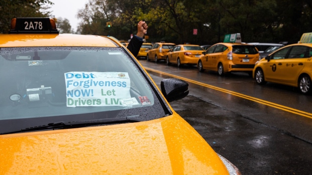 Drivers park their taxis outside Gracie Mansion during a protest demanding debt relief in New York, U.S., on Friday, Oct. 16, 2020. The New York City Council will vote on a bill to establish a new “Office of Financial Stability” within the Taxi and Limousine Commission (TLC) designed to keep tabs on the health of the city’s crumbling yellow cab industry, reported the New York Daily News.