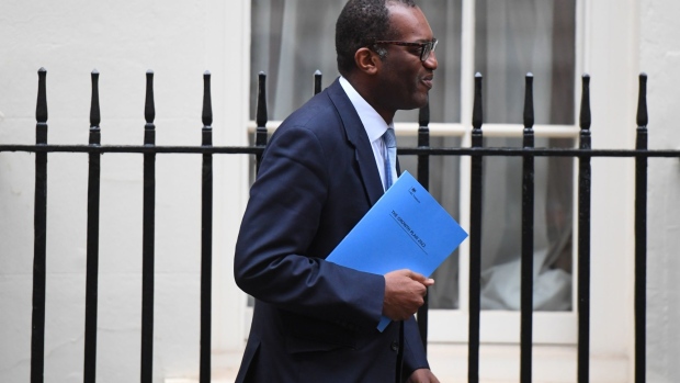 Kwasi Kwarteng, UK chancellor of exchequer, departs 11 Downing Street to present the UK's fiscal plans in Parliament, in London, UK, on Friday, Sept. 23, 2022. With expectations of tax cuts and sweeping deregulation, businesses are likely to be a big beneficiary of Kwarteng's mini-budget on Friday.