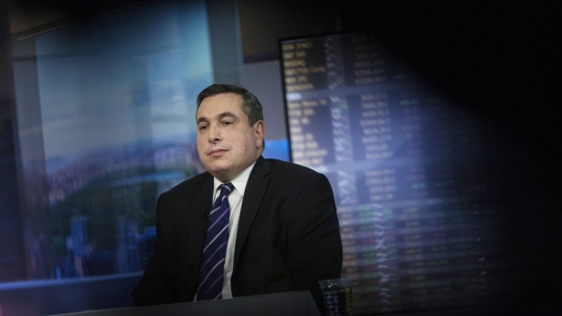 Julian Emanuel, executive director of UBS Securities LLC, listens during a Bloomberg Television interview in New York, U.S., on Friday, March 3, 2017. Emanuel discussed Deutsche Bank's plans to review strategic options over coming weeks that include a capital increase and the partial sale of its asset management business.