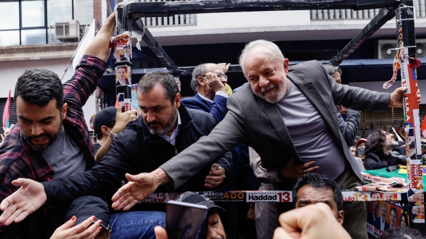 Former president Lula greets supporters during the closing campaign rally in Sao Paulo on Oct. 1, 2022.