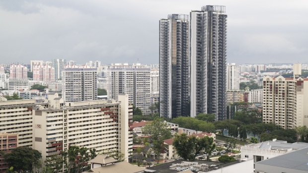 Blocks of condominium in Singapore, on Sunday, May 15, 2022. Singapore is scheduled to release its first-quarter gross domestic product (GDP) figures on May 19.