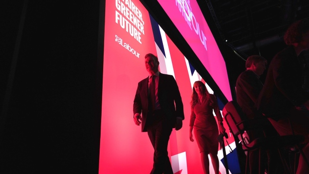  Keir Starmer, Leader of the Labour Party and Angela Rayner, Deputy Leader of the Labour Party leave the stage on the final day of the Labour Party Conference in Liverpool, on Sept. 28.