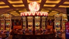 Slot machines on the main casino floor during a media preview of Resorts World Las Vegas in Las Vegas, Nevada, U.S., on Tuesday, June 22, 2021. Malaysia's Genting Group developed the 3,500-room hotel with 117,000 square feet of gambling space, 250,000 square feet of meeting space, a 5,000-seat theater, and seven swimming pools overlooking the north end of the Strip.