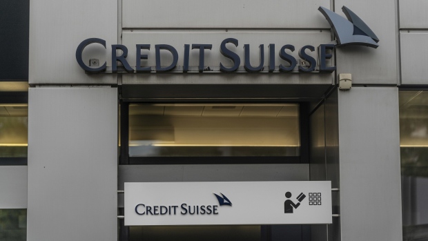 A sign above the entrace to a Credit Suisse Group AG bank branch in Geneva, Switzerland, on Thursday, Sept. 1, 2022. Credit Suisse is weighing cutting 4,000 jobs, a significant part of them in Zurich, as the lender overhauls its business after a series of financial and reputational hits, according to Handelsblatt. Photographer: Jose Cendon/Bloomberg