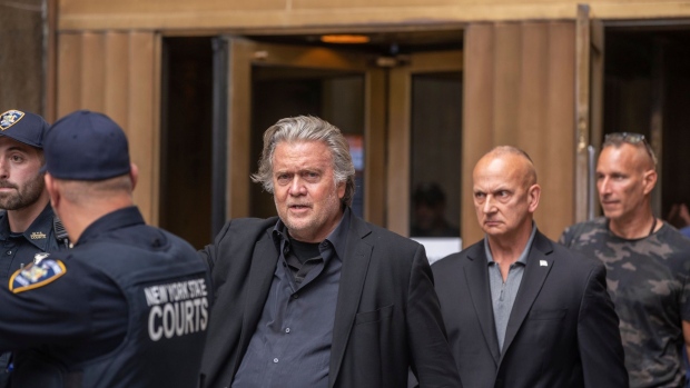 Steve Bannon, former adviser to Donald Trump, center, exits Manhattan State Supreme Court in New York, US, on Thursday, Sept. 8, 2022. Bannon is facing New York state money-laundering, fraud and conspiracy charges for allegedly bilking thousands of contributors to a privately funded US-Mexico border wall of more than $15 million.