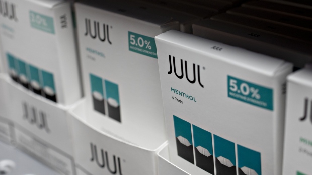 Menthos pods for for Juul Labs Inc. e-cigarettes are displayed for sale at a store in Princeton, Illinois, U.S., on Monday, Sept. 16, 2019. Faced with a worsening epidemic of teenage vaping and a mysterious illness stalking users of cigarette alternatives, the Trump administration promised to ratchet up its oversight of a burgeoning but increasingly troubled industry.