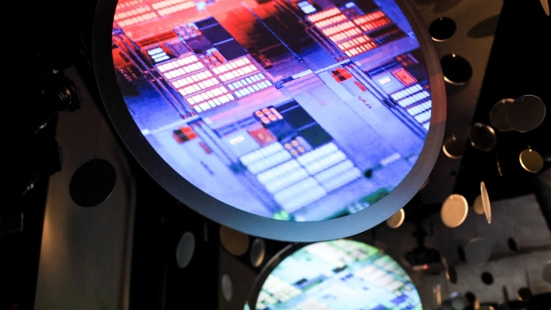 Images of semiconductor wafers at the Taiwan Semiconductor Manufacturing Co. (TSMC) Museum of Innovation in Hsinchu, on Tuesday, Jan. 11, 2022. TSMC reported a sixth straight quarter of record sales, buoyed by unrelenting demand by Apple Inc. and other customers for chips produced by the world’s largest foundry.