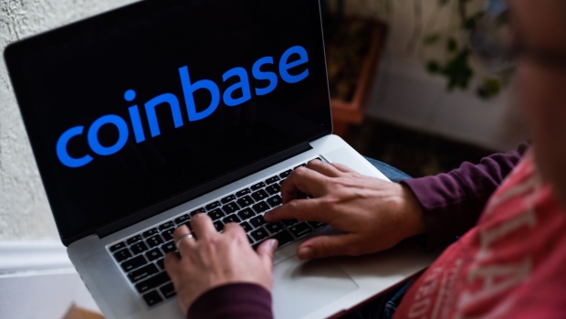The Coinbase logo on a laptop computer arranged in Hastings-on-Hudson, New York, U.S., on Tuesday, Jan. 5, 2021. Coinbase Inc. knew cryptocurrency XRP was a security rather than a commodity and "illegally" sold Ripple Labs Inc.'s tokens anyway, a customer argues in a proposed class-action lawsuit over the commissions the crypto exchange collected.