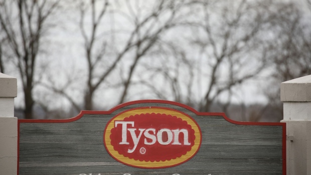 The Tyson Foods Inc. logo is seen on a box arranged for a photograph in Tiskilwa, Illinois, U.S., on Monday, Aug. 6, 2018. The largest U.S. meat company posted better-than-expected fiscal third-quarter earnings as beef demand rose and cattle costs fell, Tyson said Monday in a statement.