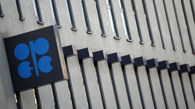 An OPEC sign hangs outside the OPEC Secretariat ahead of the the 176th Organization Of Petroleum Exporting Countries (OPEC) meeting in Vienna, Austria, on Sunday, June 30, 2019. Oil surged to a five-week high after Saudi Arabia and Russia signaled their support for an extension of OPEC+ output cuts and a U.S.-China agreement to restart trade talks improved the demand outlook.