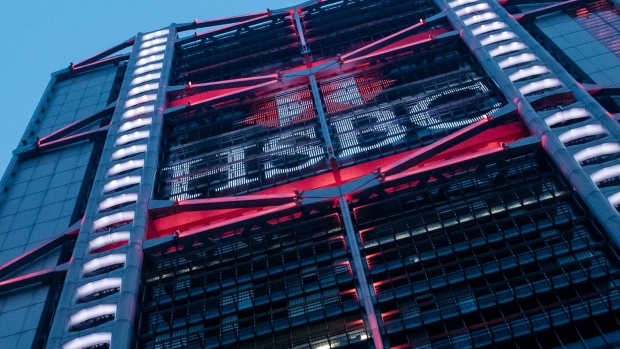 The logo for HSBC Holdings Plc is displayed on the bank's headquarters building in Hong Kong.