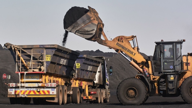 A truck is loaded with coal at the Mafube open-cast coal mine, operated by Exxaro Resources Ltd. and Thungela Resources Ltd., in Mpumalanga, South Africa on Friday, Sept. 9, 2022. South Africa relies on coal to generate more than 80% of its electricity, and has been subjected to intermittent outages since 2008 because state utility Eskom Holdings SOC Ltd. can't meet demand from its old and poorly maintained plants.