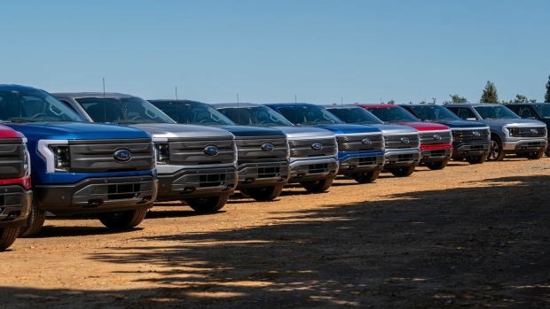 Ford Lightning F-150 pickup trucks during a media event at Vino Farms in Healdsburg, California, US, on Friday, May 20, 2022. With the release of the F-150 Lightning, Ford hopes to electrify new and traditional truck buyers alike, and eventually to replace its industry-defining gas-powered line.