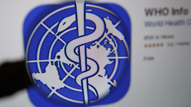 The logo for the World Health Organization (WHO) WHO Info application is displayed on a computer screen in an arranged photograph taken in Bern, Switzerland, on Tuesday, March 31, 2020. The Covid-19 pandemic has triggered a seismic wave of health awareness and anxiety, which is energizing a new category of virus-fighting tech and apps. Photographer: Stefan Wermuth/Bloomberg