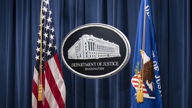 Department of Justice signage during a news conference in Washington, D.C, U.S., on Tuesday, Jan. 12, 2021. The agencies provided updates on charges related to last week's events at the U.S. Capitol.