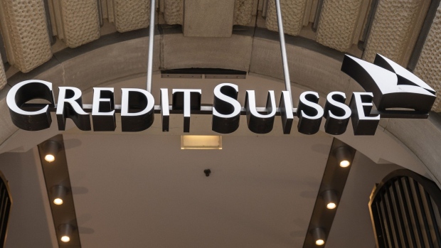 Signage hangs over the entrance of a Credit Suisse Group AG branch in Zurich, Switzerland, on Sunday, Sept. 25, 2022. Inflation in Switzerland has more than doubled since the start of the year and the State Secretariat for Economic Affairs expects it to come in at a three-decade-high of 3% for 2022. Photographer: Pascal Mora/Bloomberg