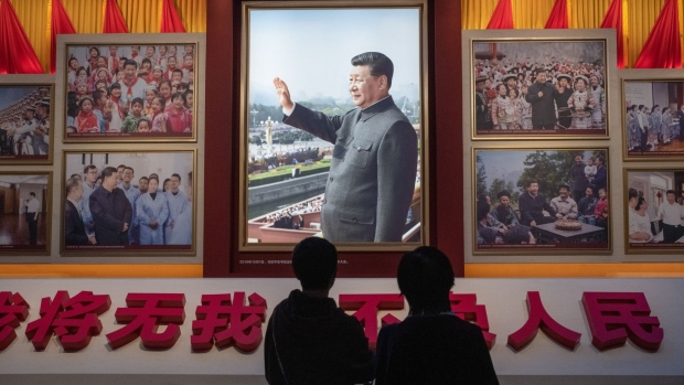 A portrait of Chinese President Xi Jinping at the Museum of the Chinese Communist Party in Beijing, China, on Tuesday, Oct. 4, 2022. China's Party Congress, which begins mid-October, is expected to see Xi secure a precedent-breaking third term in power.