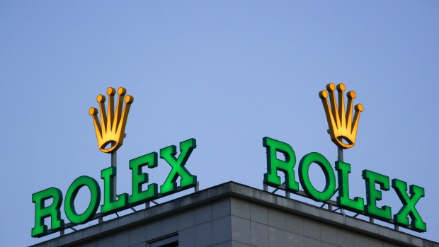 Signage for Rolex SA atop a building in the financial district of Frankfurt, Germany, on on Friday, May 6, 2022. Concerns about inflation are also stoking demand for some luxury timepieces because they can be seen as a store of value and a guard against currency fluctuations. Photographer: Alex Kraus/Bloomberg