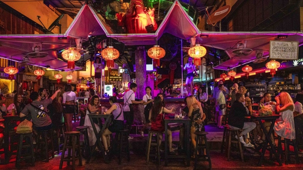 Patrons at a bar in Phuket. Photographer: Andre Malerba/Bloomberg
