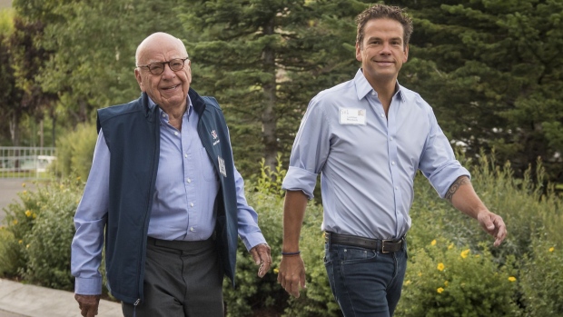 Rupert Murdoch, co-chairman of Twenty-First Century Fox Inc., left, and Lachlan Murdoch, co-chairman of Twenty-First Century Fox Inc., arrive for a morning session at the Allen & Co. Media and Technology Conference in Sun Valley, Idaho, U.S., on Friday, July 13, 2018. The 35th annual Allen & Co. conference gathers many of America's wealthiest and most powerful people in media, technology, and sports.