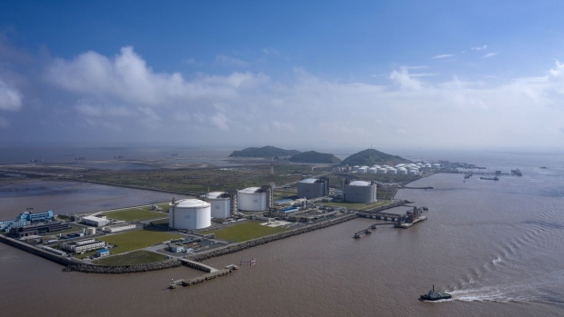 The liquefied natural gas (LNG) terminal at the Yangshan Deepwater Port in Shanghai, China, on Saturday, Oct. 9, 2021. China’s crippling energy crunch is rewriting the nation’s growth prospects, threatening a prolonged period of stubbornly high prices and weak demand across key commodities.