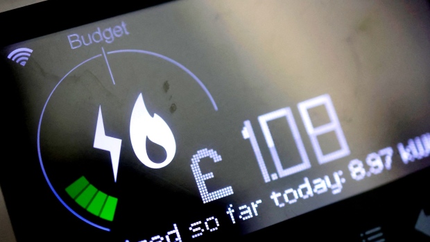 The UK’s program to freeze energy prices to help households shoulder the burden of rising costs will be scrapped at the end of this winter. Photographer: Tolga Akmen/AFP/Getty Images