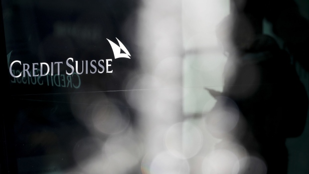 A Credit Suisse logo in the window of a Credit Suisse Group AG bank branch in Zurich, Switzerland, on Thursday, April 8, 2021. Credit Suisse Chief Executive Officer Thomas Gottstein gathered dozens of managing directors at the global bank on a conference call late Tuesday, as part of crisis-management efforts after the lender announced that it stands to lose as much as $4.7 billion amid the meltdown of hedge fund Archegos Capital Management.
