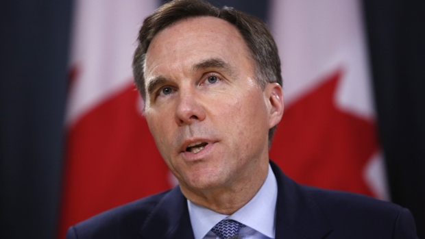 Bill Morneau, Canada's minister of finance, speaks during a news conference in Ottawa, Ontario, Canada, on Friday, March 13, 2020. The Bank of Canada cut interest rates by half a percentage point in an emergency move to buffer the nation's economy from the double hit from the coronavirus and tanking oil prices.